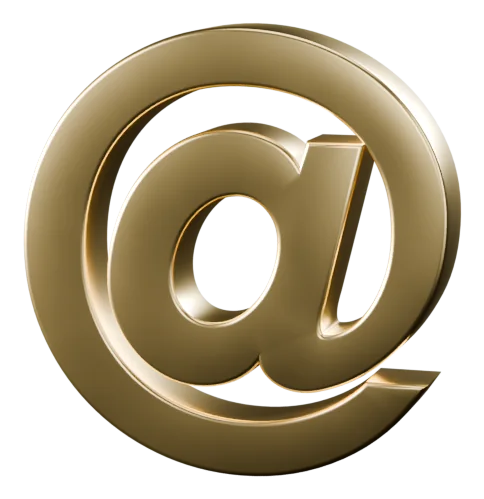 An @ sign in solid gold