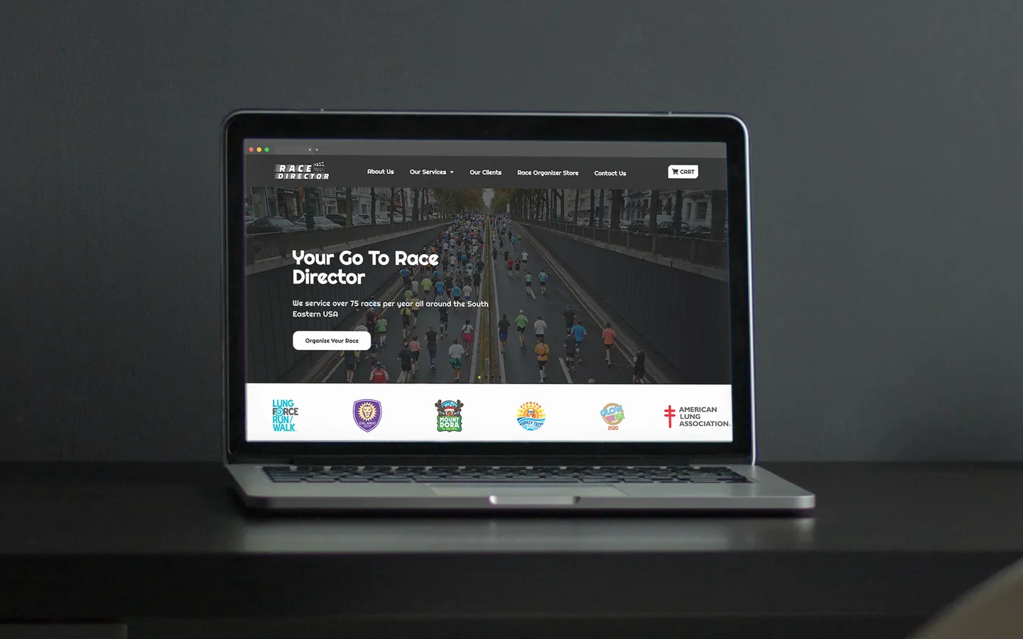 The 5K Race Director website on a laptop