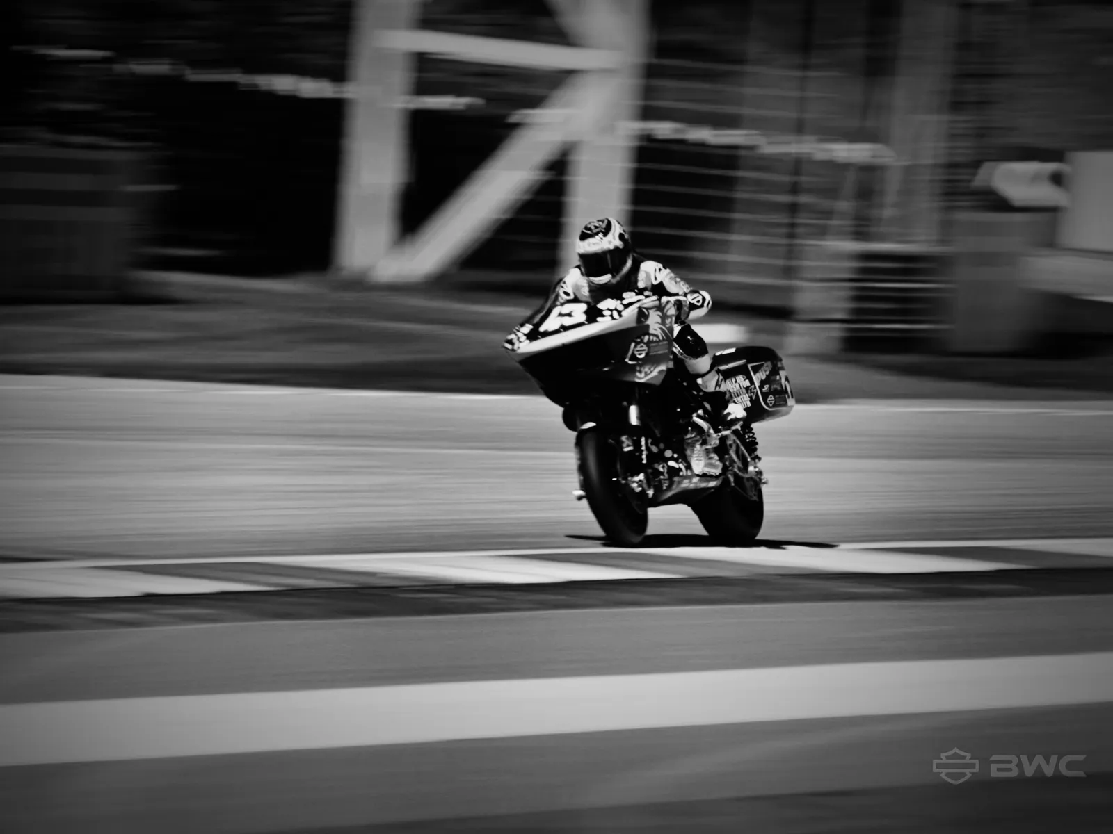 James Rispoli racing his number 43 Harley-Davidson at the Red Bull Ring, in black and white